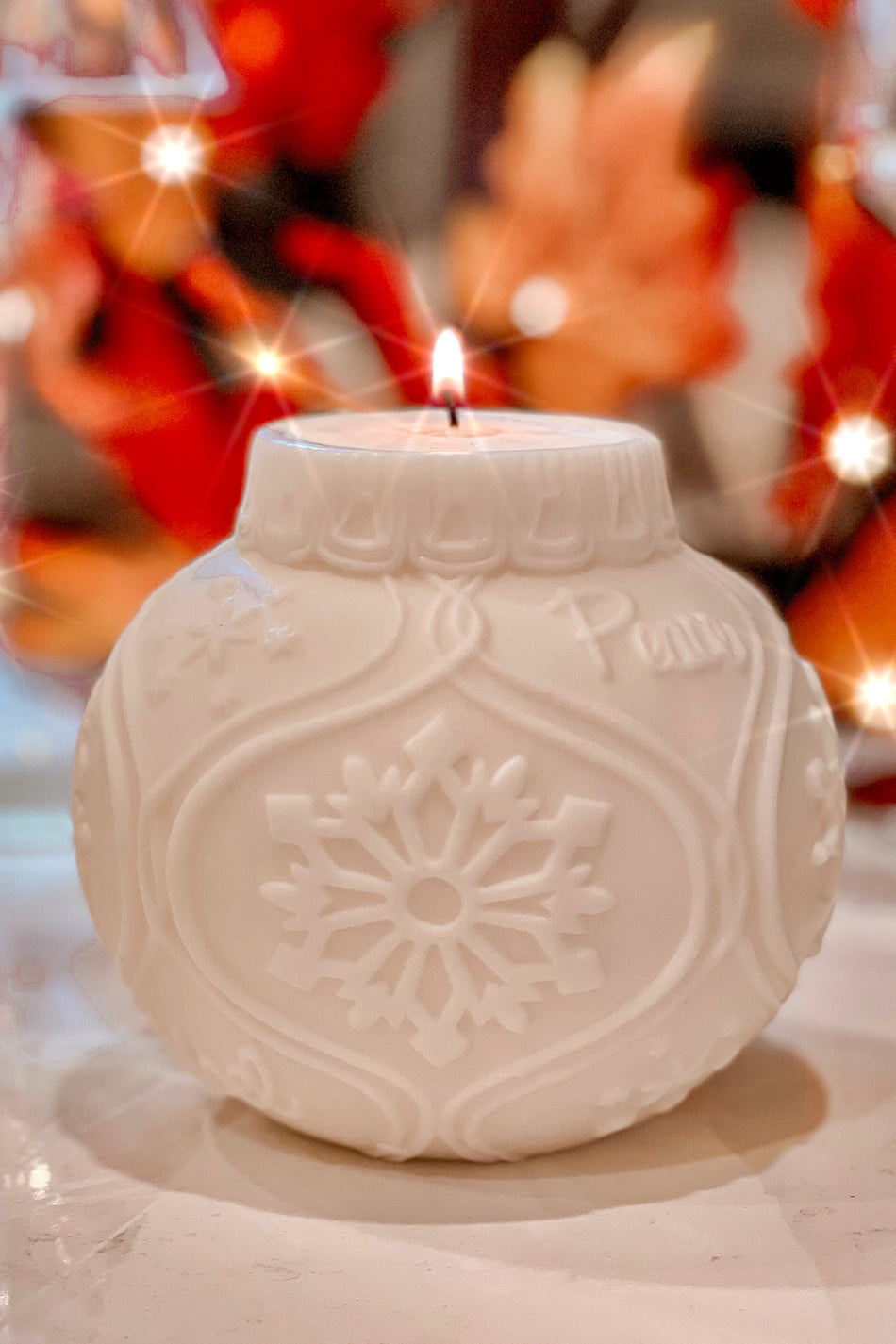 Grand Christmas Tree Ornament Candle from Soleil Candle Collections, decorative candle with festive holiday design.