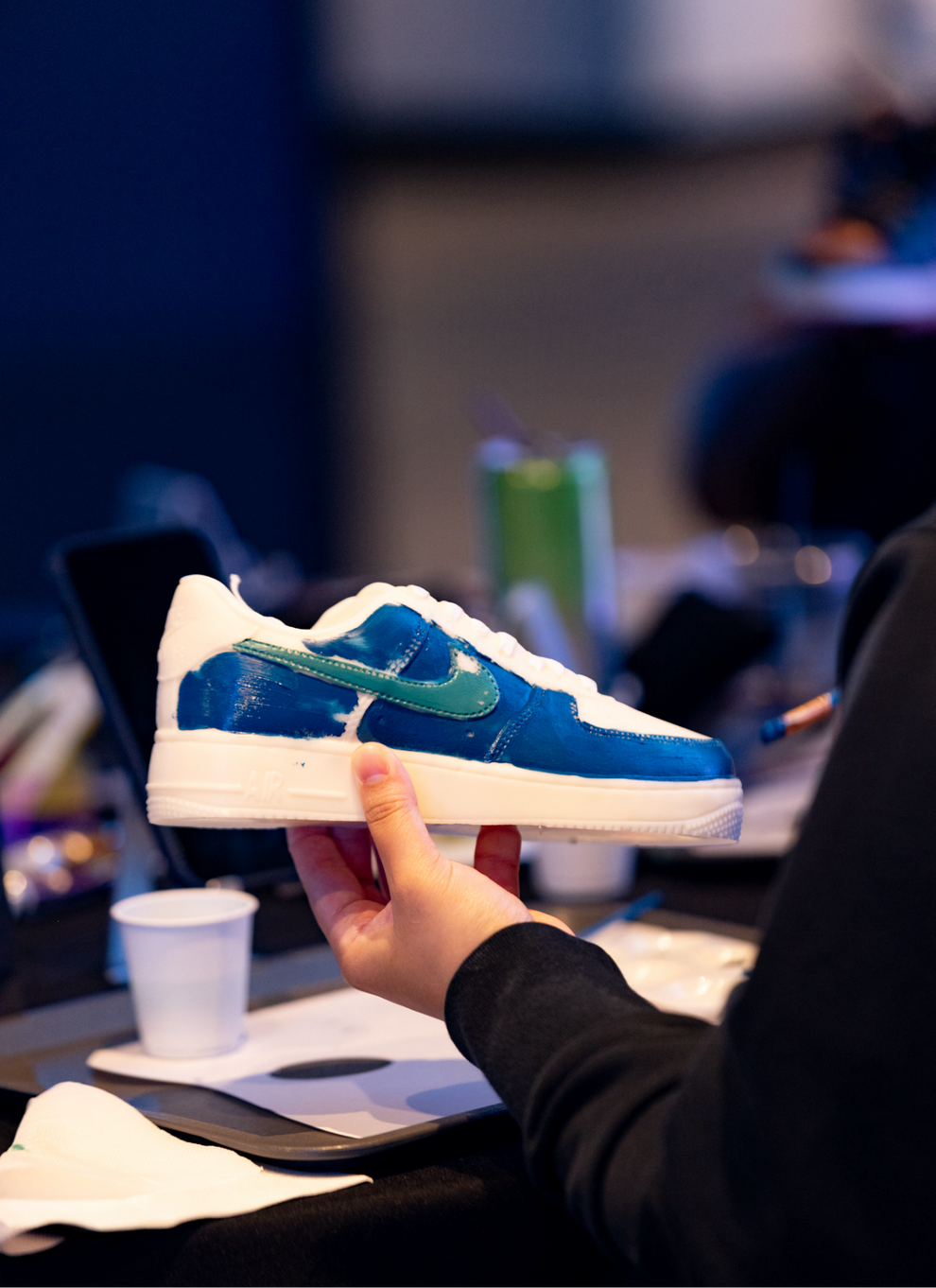 Soleil Candle Collections Kick It & Chill™ sneaker-themed experience candle in a stylish container with a casual, relaxed vibe